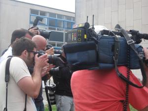 Photographers film campaigners outside Crawley Magistrates Court